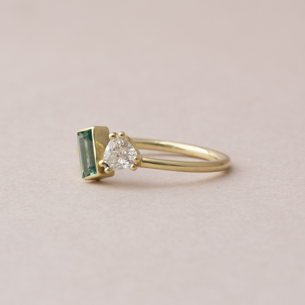 Duet ring met baguette smaragd en diamant